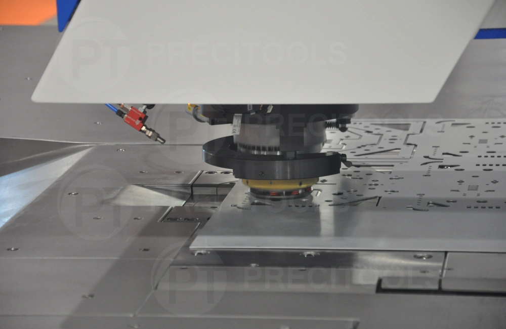 Punching sheetmetal with CNC punching machine